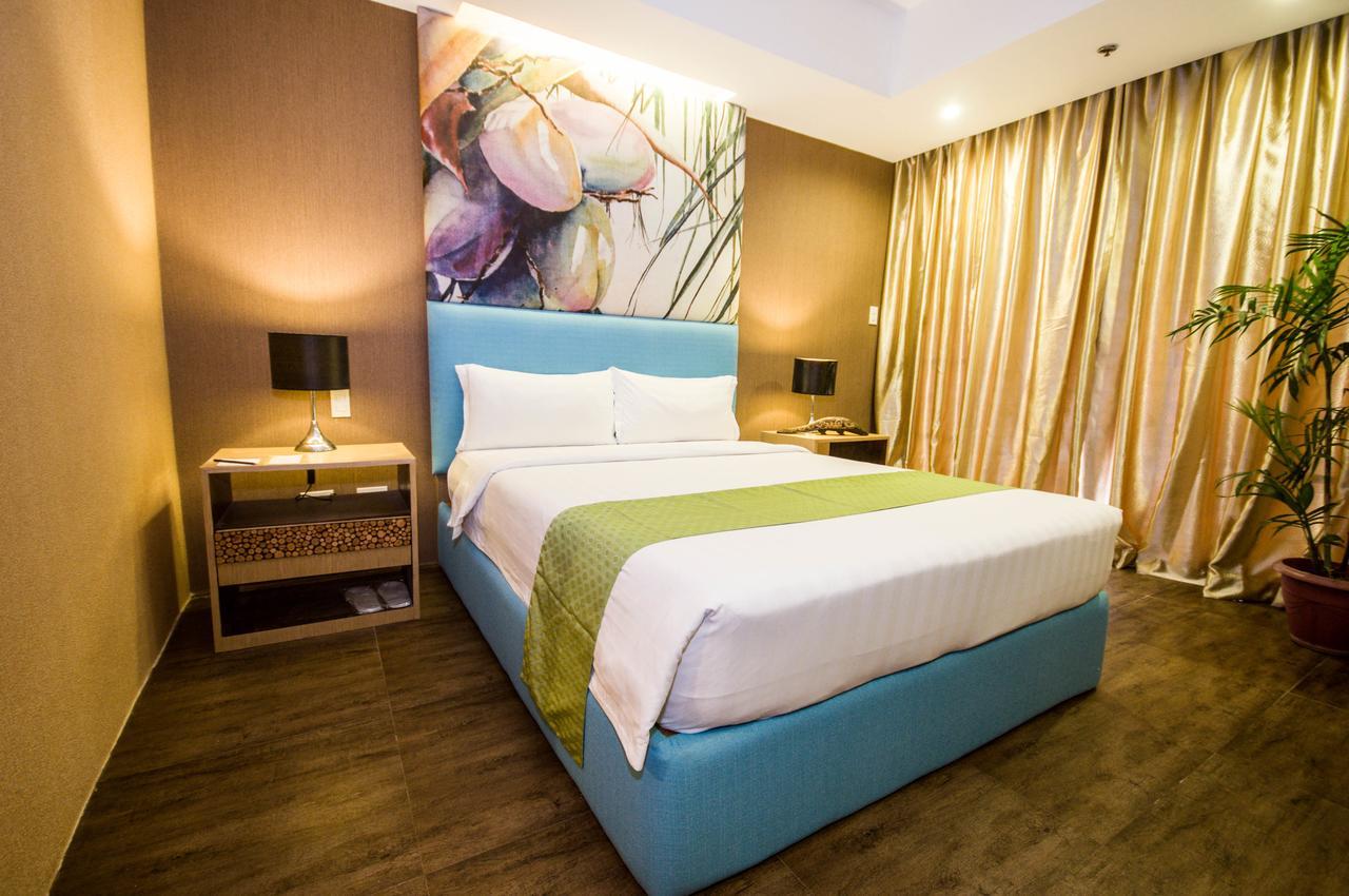 Aziza Paradise Hotel Puerto Princesa Bagian luar foto